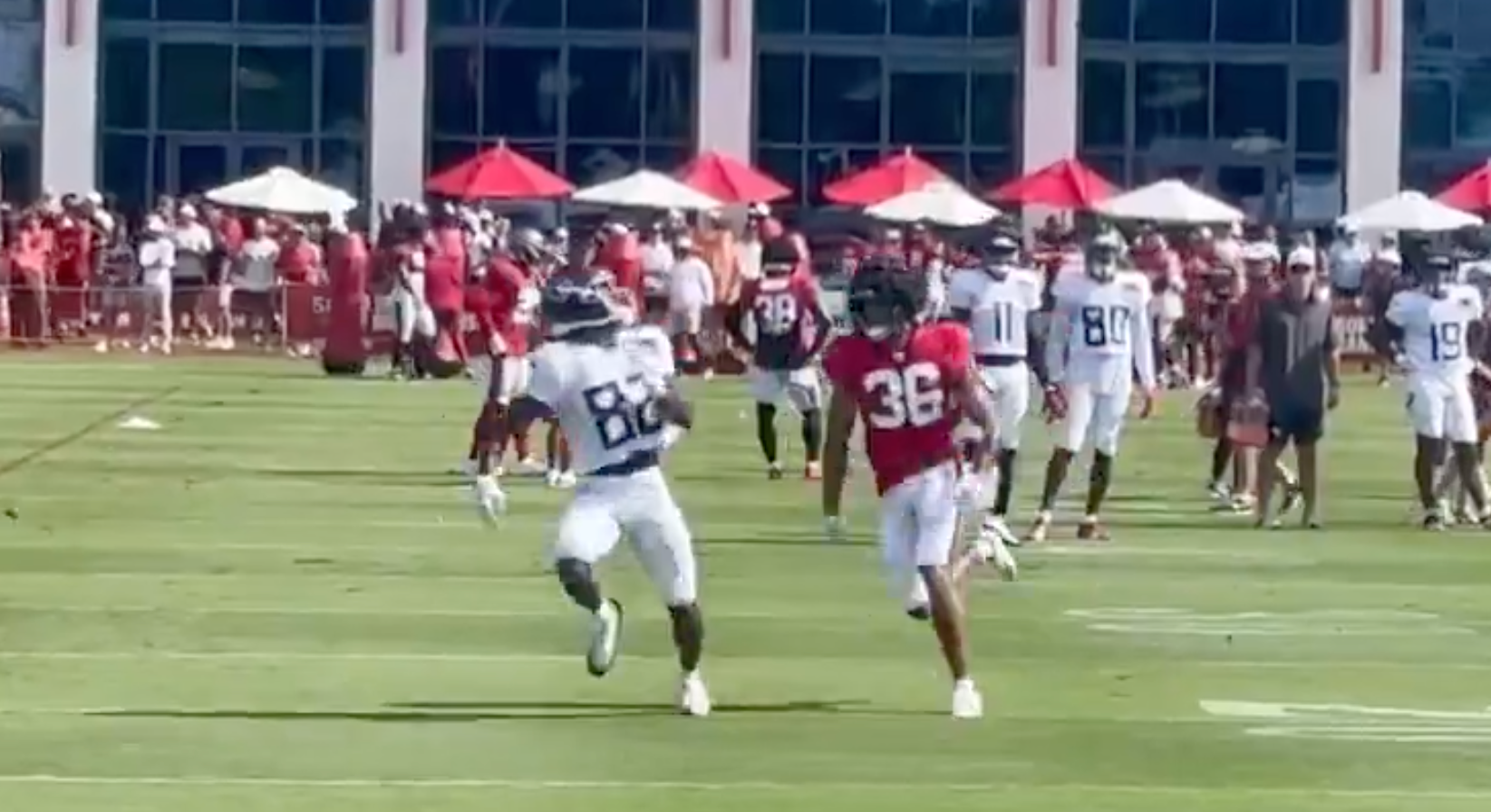 J.J. Roberts in pass coverage against a Titans receiver during joint practice.